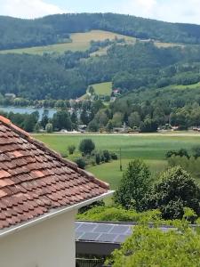 a view from the roof of a house with solar panels at Ferienwohnung DuO in Stubenberg