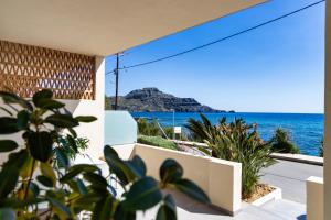 a view of the ocean from a house at Skinos Apartments in Plakias +29 photos