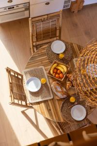 an overhead view of a table with food on it at Appart'Hôtel & Spa "Les Voiles" Le Molène in Carnac