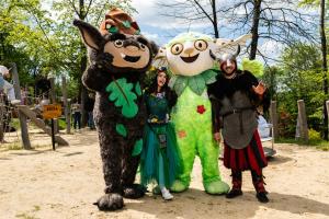 a group of people dressed in costumes posing for a picture at Apartamenty Solina 67 in Solina