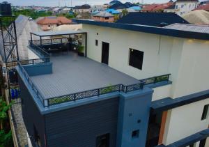 an aerial view of a building with a balcony at The Crest Triplex in Ikeja