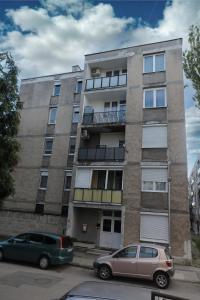 two cars parked in front of a building at Casa Calma in Esztergom