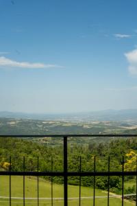 a view of a field from a fence at Locanda La Scottiglia in Seggiano
