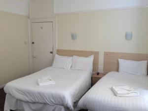 Postel nebo postele na pokoji v ubytování Lockyer House B&B
