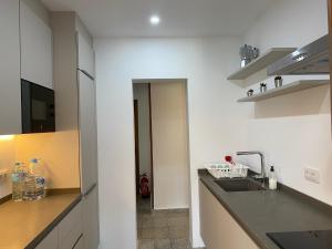 a kitchen with a sink and a counter top at Casa Luis - Javea - Spanien in Jávea