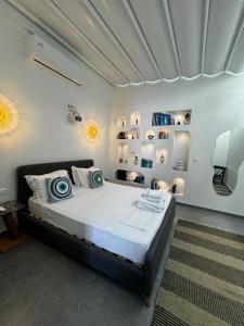 a bedroom with a large bed in a room at Olvion Luxury Living in Kallithea Halkidikis +82 photos