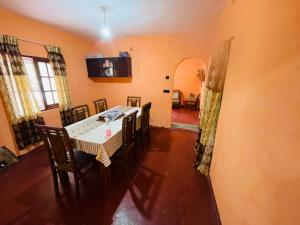 a dining room with a table and chairs at Green views in Norton Bridge