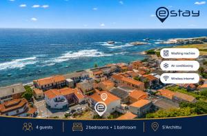 an aerial view of a town next to the ocean at Estay - Zoe&Perla - Exclusive vacation near the beach in S'archittu Cuglieri