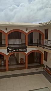 a building with a sign that reads citizen hospital at Hostal CADENA casa de huéspedes in Sucre