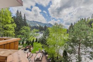 a view of a river from a house at Casa Vlasin in Poiana Brasov