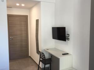 TV a/nebo společenská místnost v ubytování Bed&Cappuccini