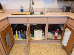 a kitchen counter with a sink and a sink at Sun Seekers Retreat 3 bedrooms in Santa Maria +39 photos