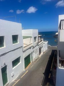 a view of the ocean from a building at Lupita's House in Punta Mujeres