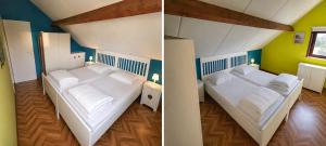 two beds in a room with green and blue walls at Maxent aan zee in Middelkerke