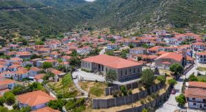 an aerial view of a small town in the mountains at Amira House Sithonia in Sykia Chalkidikis