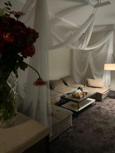a living room with a couch and a table at Safety house in Tabuk