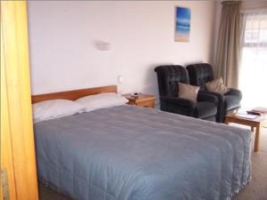 Postel nebo postele na pokoji v ubytování Austria Motel