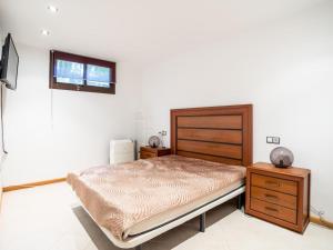 a bedroom with a bed and a dresser at Paradise Beach - Seaviews - BBQ - Large Terrace - Pool & Pool Bar in Playa Paraiso +10 photos