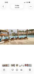 a screenshot of a webpage of a pool with benches at Veranda resort in Hurghada