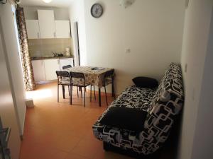 Posteľ alebo postele v izbe v ubytovaní Apartments Bobbi + 30 fotografií