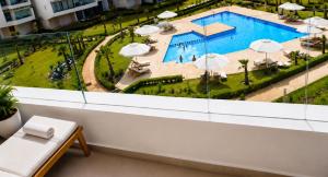 a view of a pool from a hotel room at Ocean Therapy in Dar Oulad Hajj Kassem