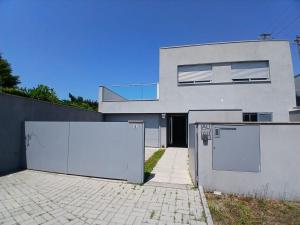 a white house with two refrigerators in front of it at Casa Estradinha Azul in Amarante +18 photos