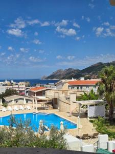 a view of a resort with a swimming pool at Villa Crown Silvia in Dobra Voda