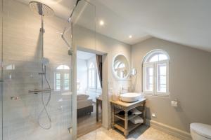 a bathroom with a shower and a sink at Von Landsberg in Hennef +144 photos