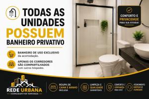 a sign in a bathroom with a toilet and a sink at Loft 10 com ar-condicionado da Rede Urbana in Indaiatuba