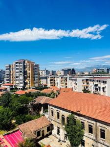 a view of a city with buildings and a blue sky at Shkodra Central Corner in Shkodër