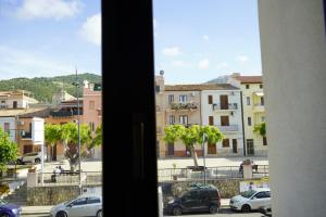 a view of a city from a window at L'antica Dimora Fronte Mare in Finale