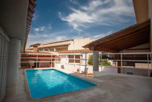 a swimming pool on the balcony of a building at Casa La Fuente in Chella
