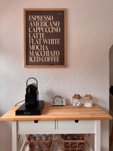 a table with a blackboard on the wall at Panorama Domblick in St. Blasien