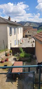 a view of a house from a balcony at Gite des pecheurs, Gorges du Tarn in Mostuéjouls