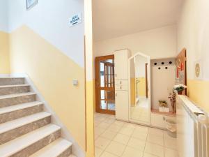 a staircase in a house with a hallway at Rooms Čehovin in Postojna +43 photos