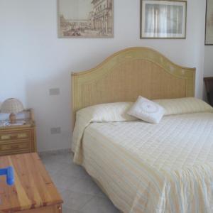Posteľ alebo postele v izbe v ubytovaní Residence Le Rose