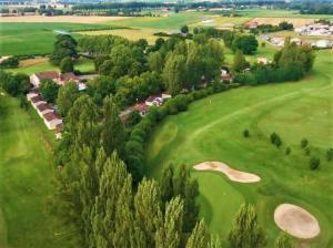 an aerial view of a golf course at Chalet La Caz'à Joooh in Rivières