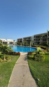 a walkway leading to a swimming pool in a building at Villa Evelia, Pool, Near Nuevo Vallarta in Mezcales