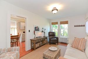 a living room with a couch and a chair at Pigeon Hill in Rockport