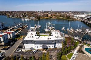 an aerial view of a marina with boats in the water at Captains Quarters Waterfront & Pool in Annapolis