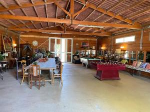 a large room with a table and pool tables at Original Friendly Boat in Sant Pau dʼOrdal