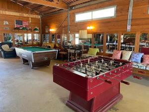 a large room with a pool table in it at Original Friendly Boat in Sant Pau dʼOrdal