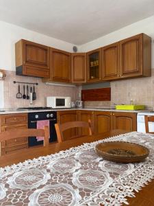 a kitchen with a table with a plate on it at Apartma Suzy in Bovec