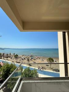 a view of a beach from the balcony of a condo at Seaview Premium Apartment in Durrës