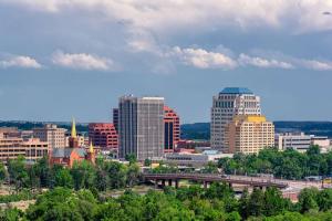 a city skyline with a bridge and buildings at Glen Eagles King Nook in Colorado Springs +2 photos