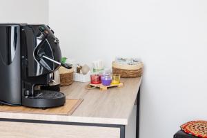 a coffee machine sitting on a counter with baskets at GioLì in Matino