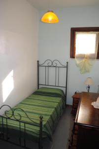 Appartamenti Spiaggia Bianca客房内的一张或多张床位