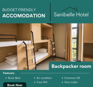a room with two bunk beds in it at Sanibelle Hotel in Coron +14 photos