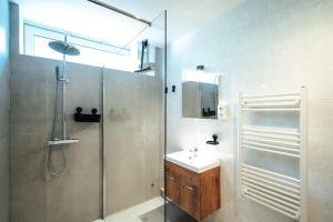 a bathroom with a shower and a sink at ReCenter in Brecht +40 photos