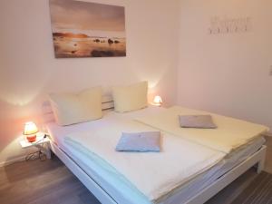 En eller flere senge i et værelse på Altstadt Fairmietung